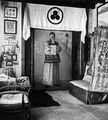 Фотография. Рабочий кабинет в Кулу с портретом работы Святослава 'Н.Р.' 1933 года.